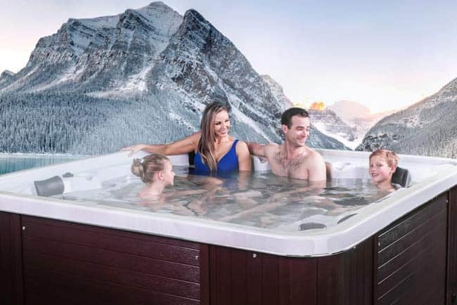 Family relaxing in the hot tub
