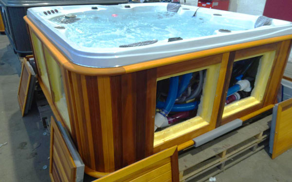 arcticspas full hot tub with open cabinet